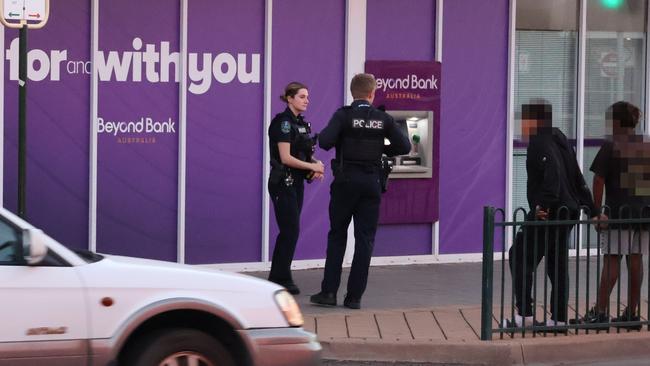 Police with some of Port Augusta’s self-proclaimed youth gangs, which include children as young as 10 who roam the streets. Picture: Riley Walter