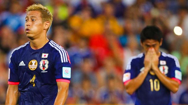 Keisuke Honda missed a hatful of chances as Japan beat Iraq 1-0.