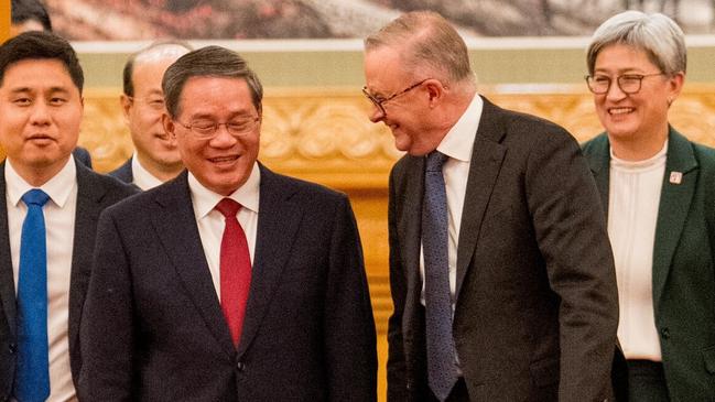 Anthony Albanese and Foreign Minister Penny Wong are greeted by Chinese Premier Li Qiang at the Great Hall of the People in Beijing last November.