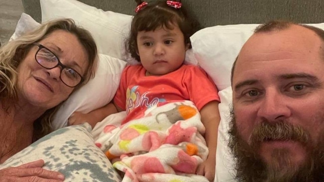 Adelynn (centre), the daughter of missing woman Tahnee Shanks, after being reunited with her grandmother Leanne, from Brisbane, and uncle Ben, from Mackay, in Mexico. Picture: Supplied.