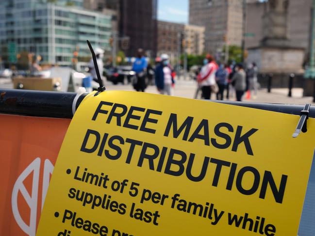 Free masks are being distributed in New York. Picture: Getty Images/AFP