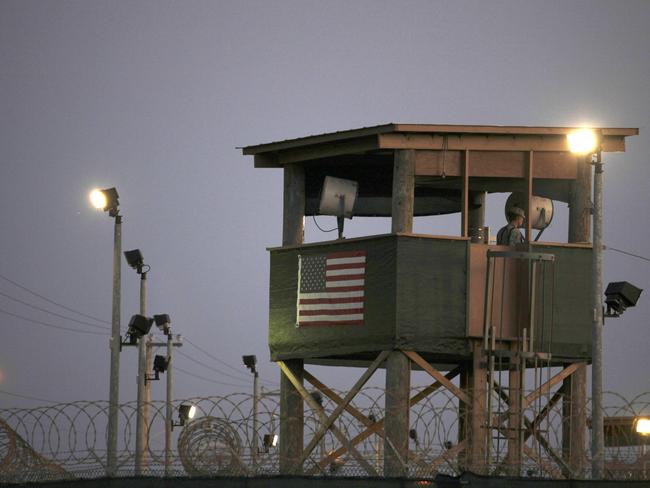 A Guantanamo guard keeps watch from a tower overlooking the detention facility at Guantánamo Bay U.S. Naval Base, Cuba, in 2010. Picture: /Brennan Linsley