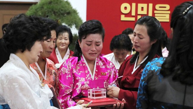 The Communist Mother’s Honour Award is handed out at the conference in Pyongyang. Picture: AFP