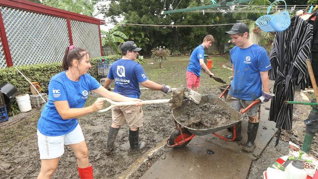 Flood clean-up around Tumbulgum with volunteers from Global Care. Picture Mike Batterham