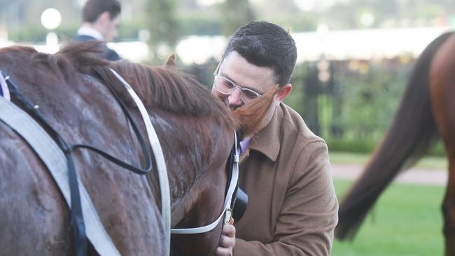 Mitchell Beer and Mnementh share a moment after the Listed Santa Ana Lane Sprint Series Final at Flemington. Picture: Reg Ryan/Racing Photos via Getty Images