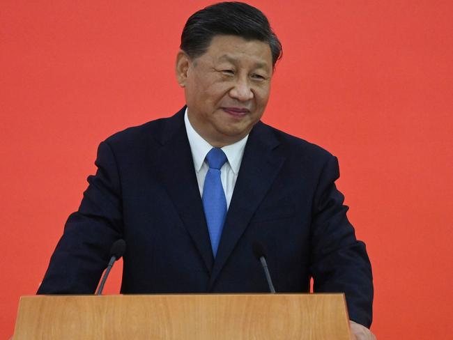 China's President Xi Jinping speaks following his arrival via high-speed rail across the border in Hong Kong on June 30, 2022, for celebrations marking the 25th anniversary of the city's handover from Britain to China. (Photo by Selim CHTAYTI / POOL / AFP)