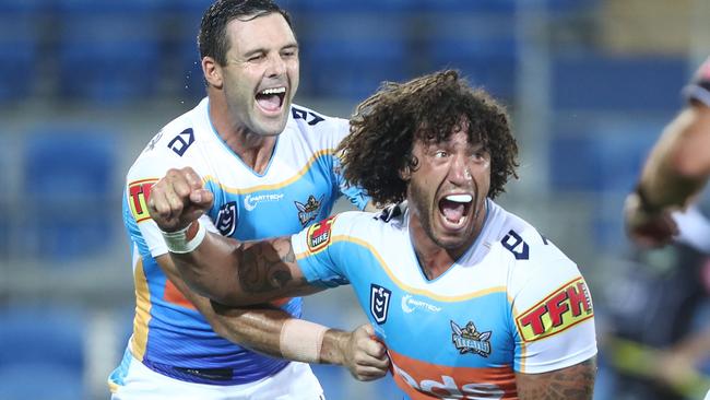 Veteran second-rower Kevin Proctor celebrates a try for the Titans. Picture: Getty Images