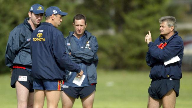 Schwerdt, second from left, with Paul Hamilton, Don Pyke and Neil Craig at Crows pre-season training in 2004.