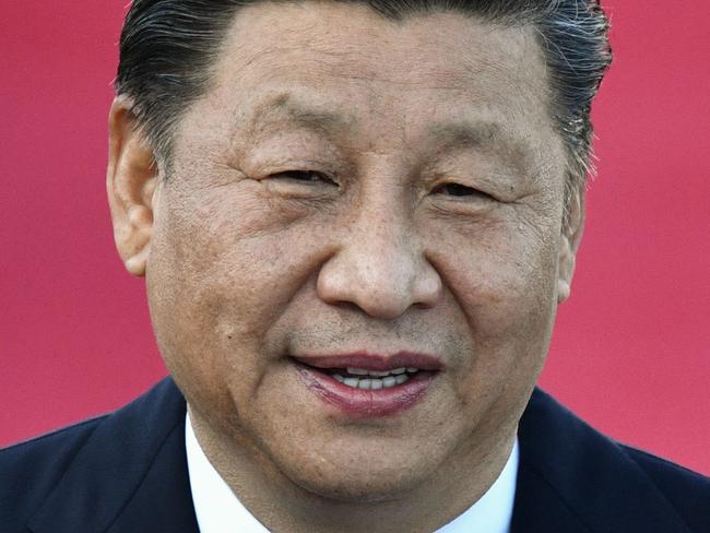 China's President Xi Jinping speaks upon his arrival at Macau's international airport in Macau on December 18, 2019, ahead of celebrations for the 20th anniversary of the handover from Portugal to China. - Chinese president Xi Jinping landed in Macau on December 18 as the city prepares to mark 20 years since the former Portuguese colony was returned, a celebration that stands in stark contrast to months of unrest in neighbouring Hong Kong. (Photo by Anthony WALLACE / AFP)