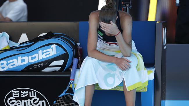 Karolina Pliskova feels the strain in her match against Simona Halep. Picture: AP