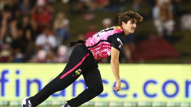 Sean Abbott of the Sixers bowls during the Men's Big Bash League match between the Sydney Sixers and the Adelaide Strikers at Coffs Harbour International Stadium, on January 17, 2023, in Coffs Harbour, Australia. Picture: Chris Hyde/Getty Images.