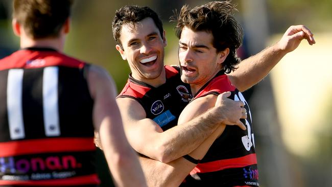 VAFA: Charles Holmes celebrates a goal for Old Xaverians. Picture: Josh Chadwick