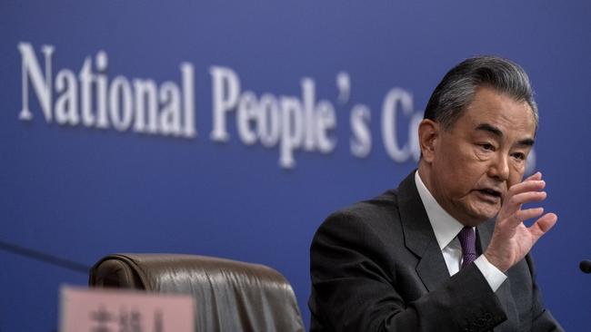 Chinese Foreign Minister Wang Yi speaks during a press conference for domestic and foreign journalists as part of the National People's Congress.