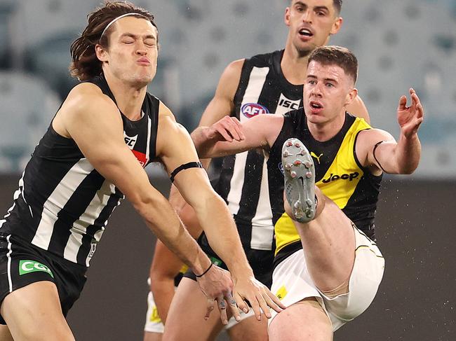 AFL Round 2. Collingwood v Richmond at the MCG. 11/06/2020.  Jack Higgins of the Tigers  snaps at goal   . Pic: Michael Klein