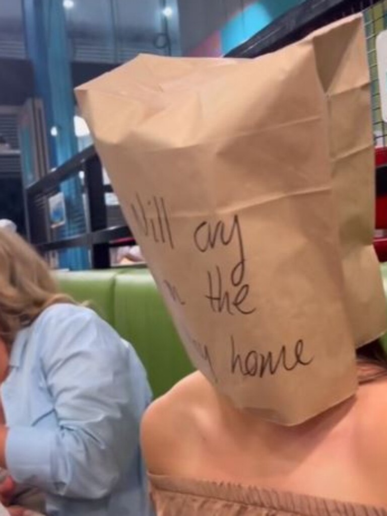 Another woman filmed her friend getting a paper bag put over her head. Picture: TikTok / Bec Hardgrave