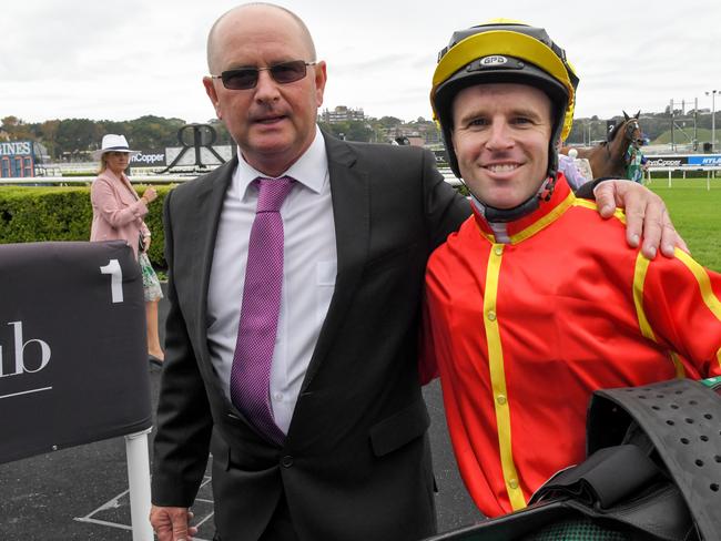 Jockey Tommy Berryis seen in the mounting yard with trainer Toby Edmonds after riding Winter Bride to victory in race 1, the Wenona Girl Quality during Randwick Guineas Day at Royal Randwick Racecourse in Sydney, Saturday, March 9, 2019. (AAP Image/Simon Bullard) 