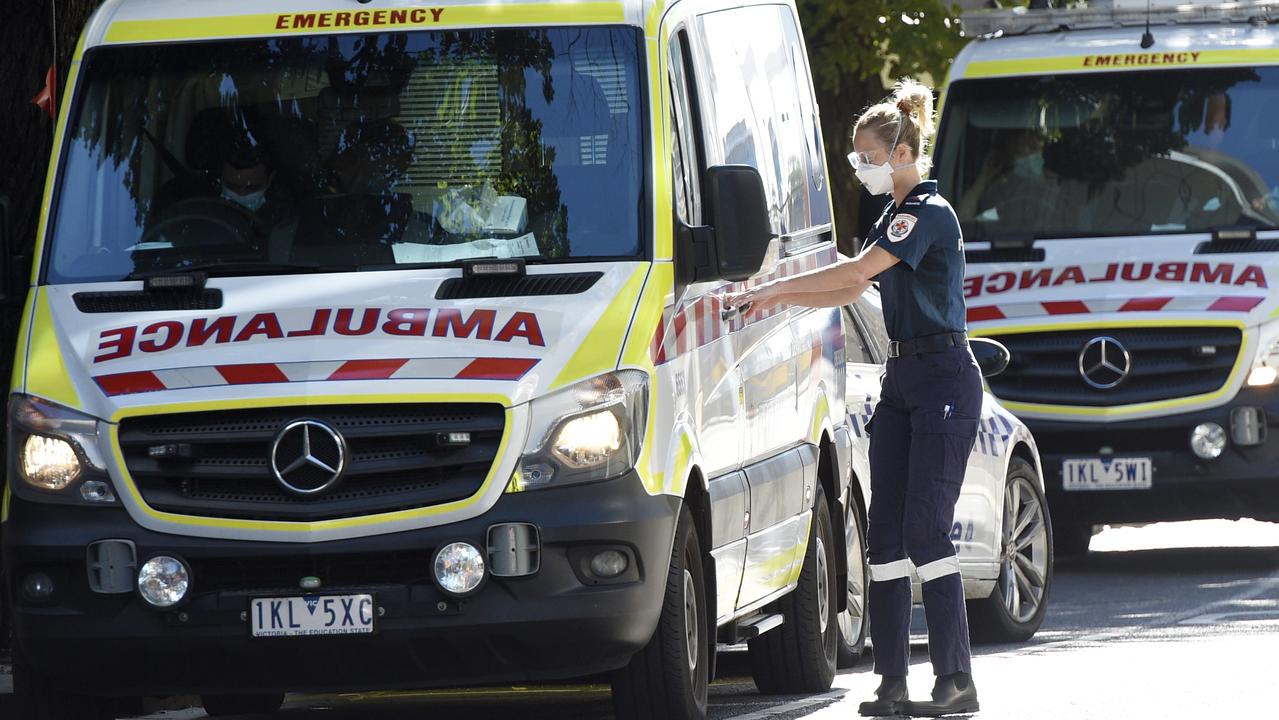 Paramedics head out on another job from the Royal Melbourne Hospital as Victoria declares a Code Brown alert for the public health care system. Picture: NCA NewsWire / Andrew Henshaw