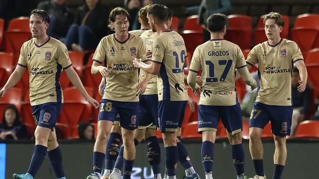 NEWCASTLE, AUSTRALIA - APRIL 19: The Jets celebrate a goal that was scored after it deflected off Phoenix goalkeeper Alexander Paulsen during the A-League Men round 25 match between Newcastle Jets and Wellington Phoenix at McDonald Jones Stadium, on April 19, 2024, in Newcastle, Australia. (Photo by Scott Gardiner/Getty Images)