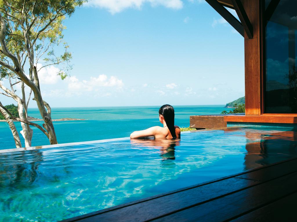 There’s been a rise in the number of bookings for high-end Australian resorts, like Qualia on Hamilton Island, according to Qantas.