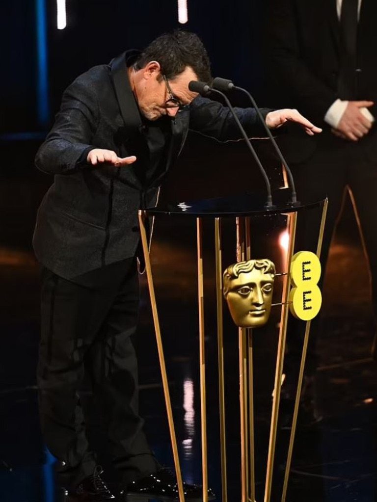 Fox gestures for the audience to take a seat. Picture: Getty