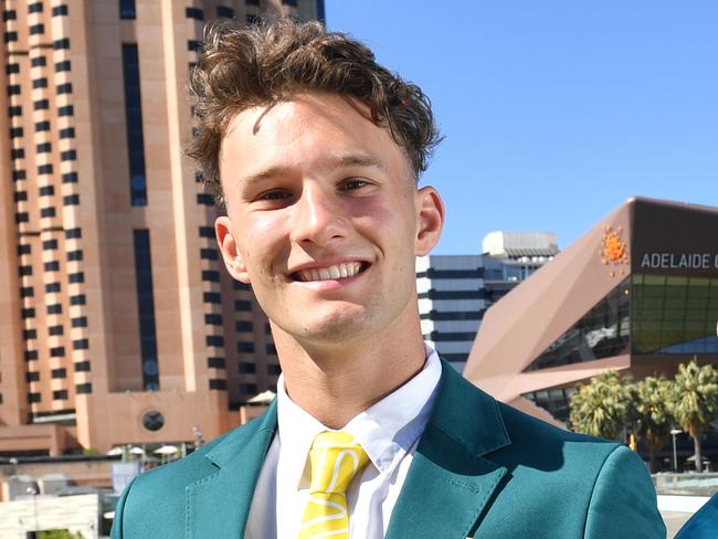 Commonwealth Games Athletes Kurtis Marschall (Pole vault) and Dane Sampson (Shooter) pose for a photograph on the Adelaide Footbridge, Adelaide on Friday the 2nd of February 2018.  Kurtis and Dane are modelling  the new Commwealth Games uniforms. (AAP/ Keryn Stevens)