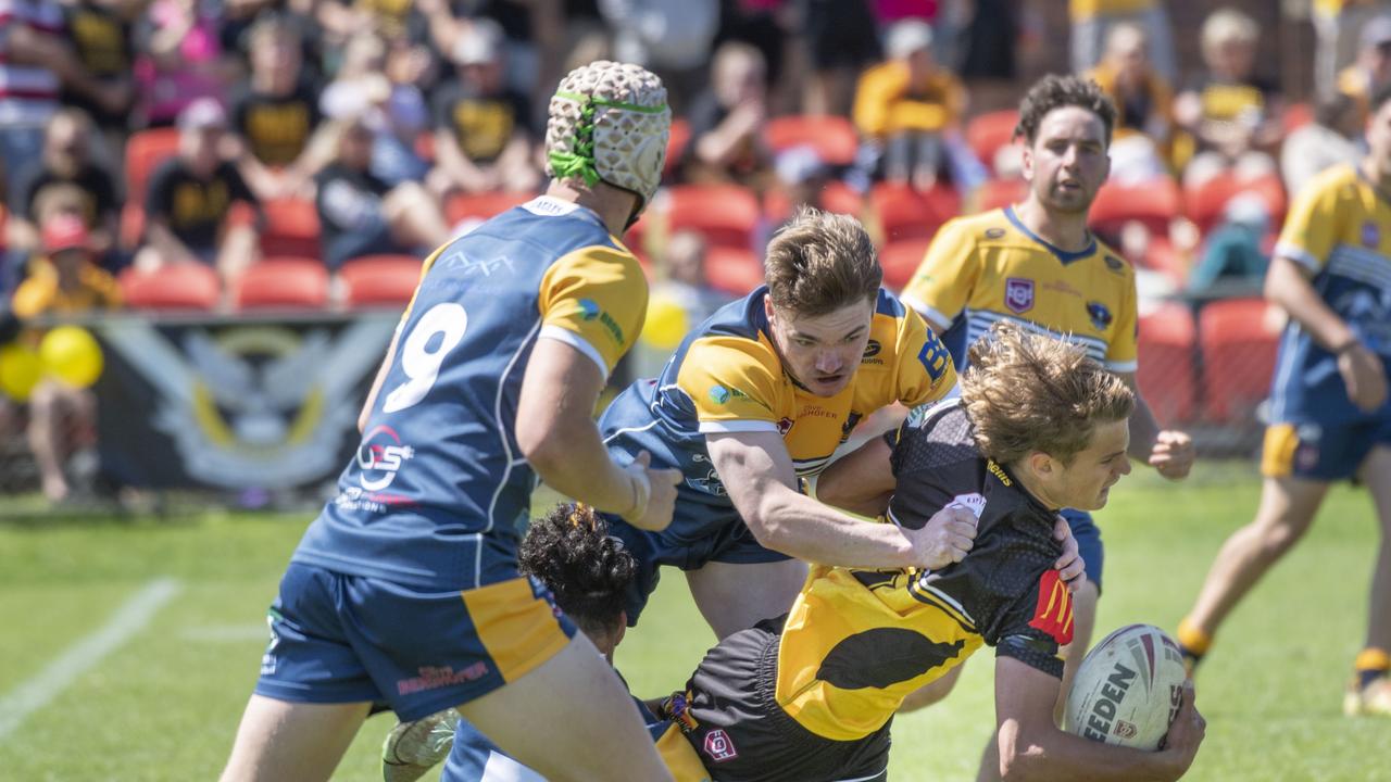 Gatton’s Kaden Buhse is bought down by the Highfields defence during a TRL Under-19s match. Picture: Nev Madsen.