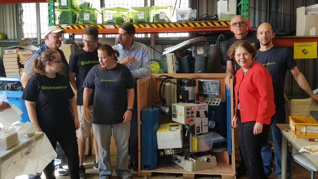 State Development Minister Cameron Dick, centre, with Substation 33’s Tony Sharp, third right and YFS chief executive Cath Bartolo, right.