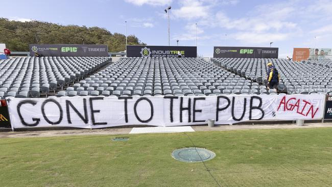 Mariners fans put up banners in protest during the round eight A-League Men's match between Central Coast Mariners and Sydney FC at Central Coast Stadium. Pic: Scott Gardiner/Getty Images