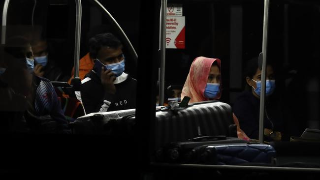 Returning travellers are taken straight from the plane to quarantine in Melbourne hotels as Qantas QF112 flight carrying 150 people from Delhi landed last week. Picture: Getty Images