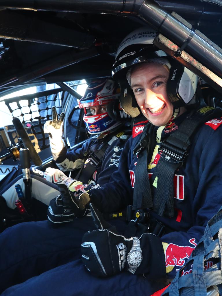 Journalist Cara Jenkins joins Red Bull Holden racing team driver Jamie Whincup in a hot lap. Picture: TAIT SCHMAAL.