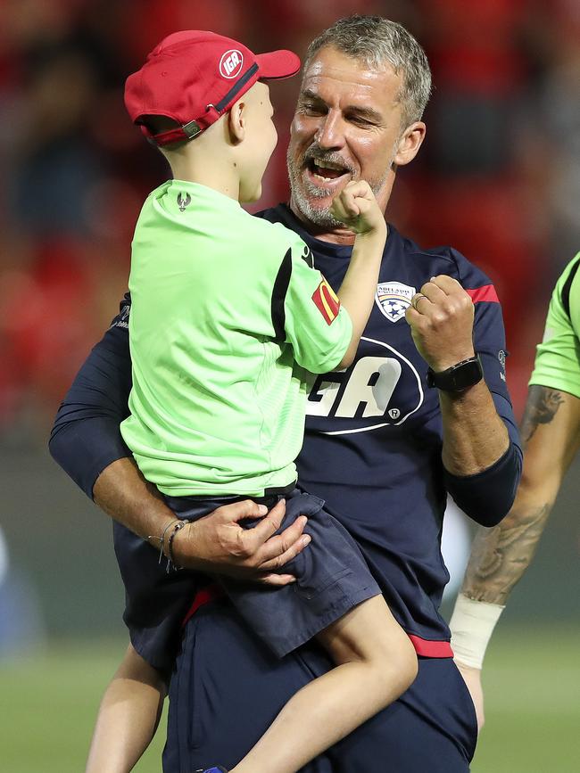 Ace Kounavis celebrates last month’s A-League triumph over Melbourne Victory with Adelaide United coach Marco Kurz. Picture: Sarah Reed