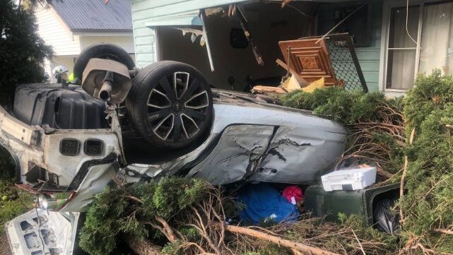 Car crashes into a home at Telarah after a pursuit. Credit: NSW Ambulance