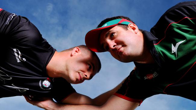 NT Rugby Union Darwin South club captain Steven Eardley, left, with club president James de Dassel. The Rabbitohs are 40 years old this year.