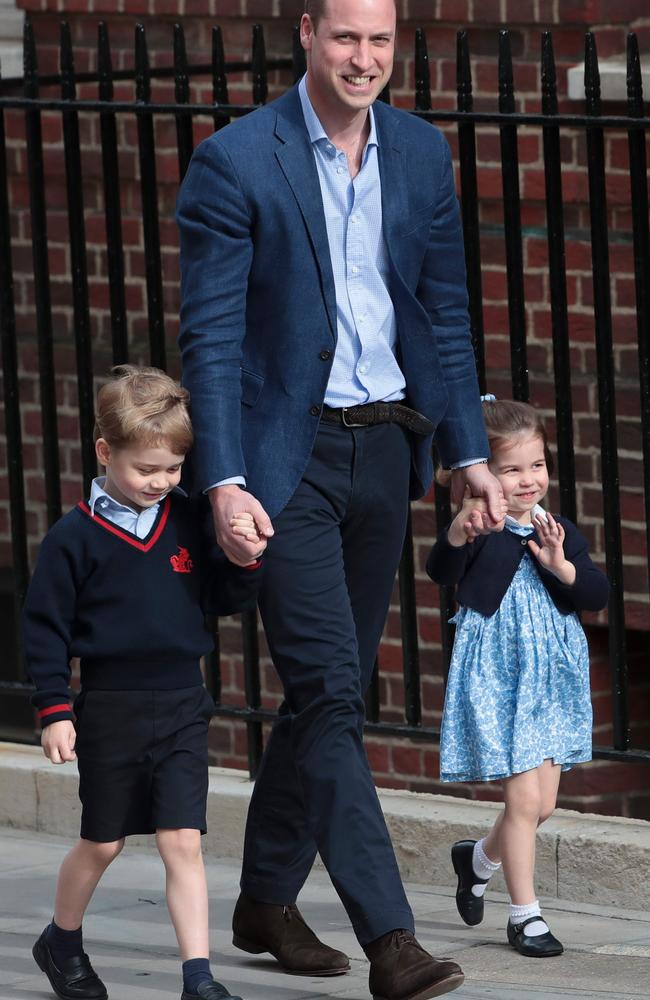 The Duke of Cambridge beamed as he led his two eldest children into the Lindo wing to see their new little brother, in accordance with royal tradition. Picture: AFP Photo / Daniel Leal-Olivas