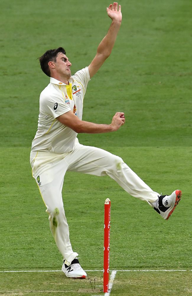 Pat Cummins bowls on the first day of his Test captaincy, in the Ashes opener of 2021-22 at the Gabba. He bowled himself first-change and took 5-38. Picture: Albert Perez – CA/Cricket Australia via Getty Images