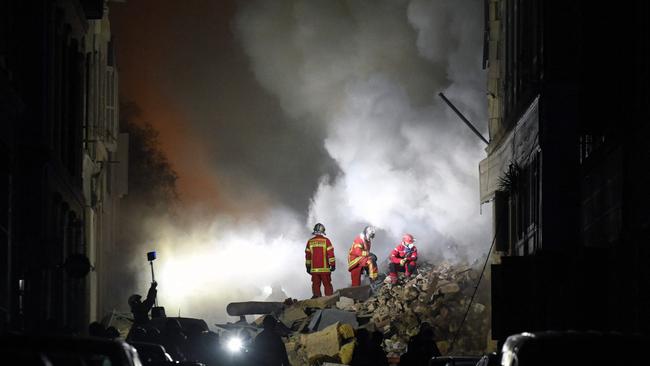 Rescuers work at the scene where a building collapsed in the southern French port city of Marseilles. Picture: Nicolas Tucat/AFP