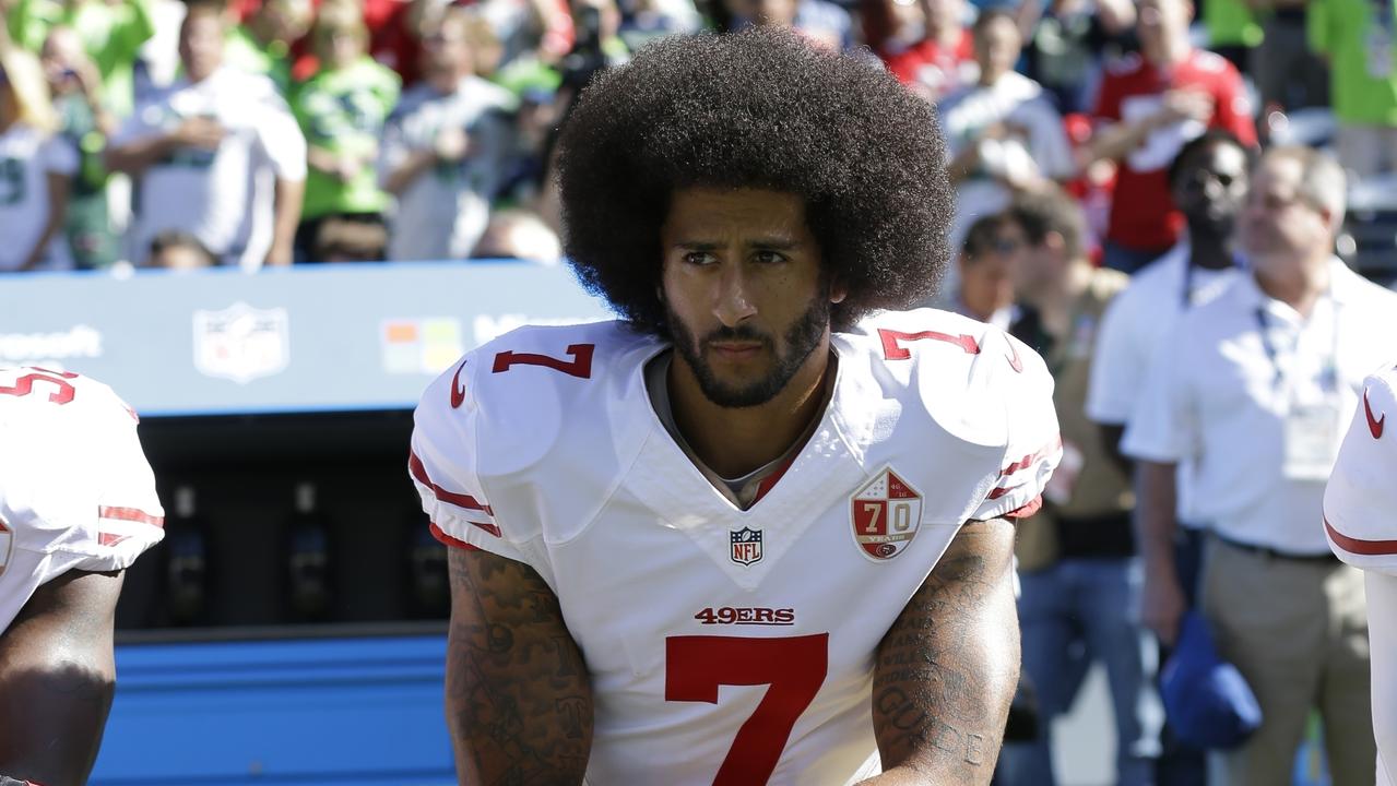 San Francisco 49ers' Colin Kaepernick kneels during the national anthem.