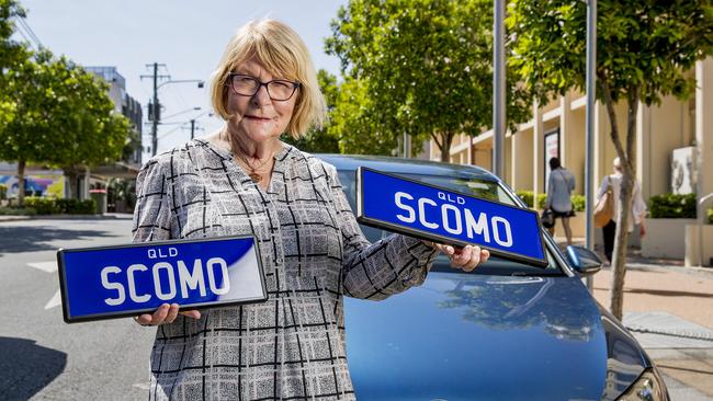 Gold Coast Councillor Dawn Crichlow with her "SCOMO" number plates that she wants to sell to Prime Minister Scott Morrison. Picture: Jerad Williams