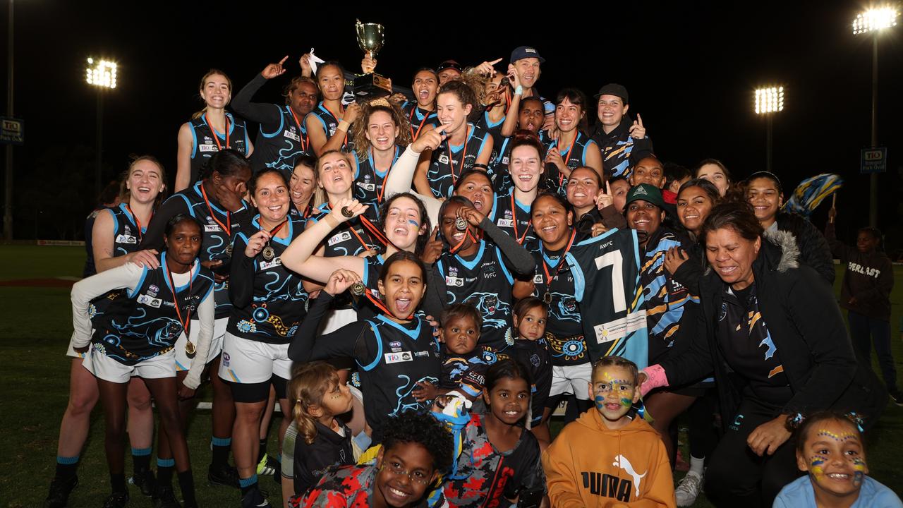 Alkamilya celebrate after winning the 2023 CAFL senior women's grand final. Picture: AFLNT Media