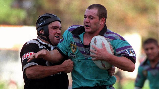 The Chargers were one of the franchises to have a crack at the rugby league market before the Titans&gt; Here, Kris Currie tries to brush past Wests’ Kevin McGuinness back in 1996.