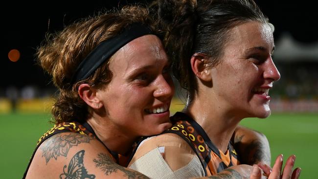 Tilly Lucas-Rodd (left) says they’ve been freed up after handing the captaincy to Emily Bates ahead of the Hawks’ stunning 2024 campaign. Picture: Albert Perez / Getty Images