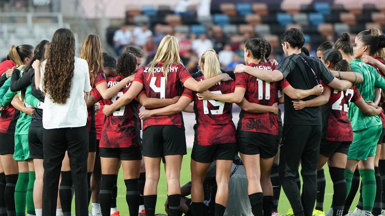 HOUSTON, TEXAS - FEBRUARY 25: The Canada Womens National Team huddles following a Group C - 2024 Concacaf W Gold Cup game against Paraguay at Shell Energy Stadium on February 25, 2024 in Houston, Texas. (Photo by Alex Bierens de Haan/Getty Images)