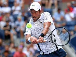 Serbia's Novak Djokovic fires a return at Portugal's Jaoa Sousa in their round-of-16 clash at the US Open. Picture: Matthew Stockman/Getty