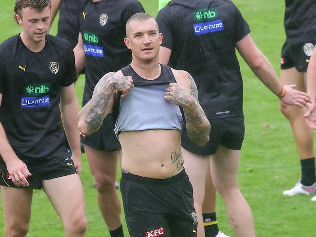 Richmond FC training at Punt Rd oval. Dustin Martin changes his top. Picture: Ian Currie