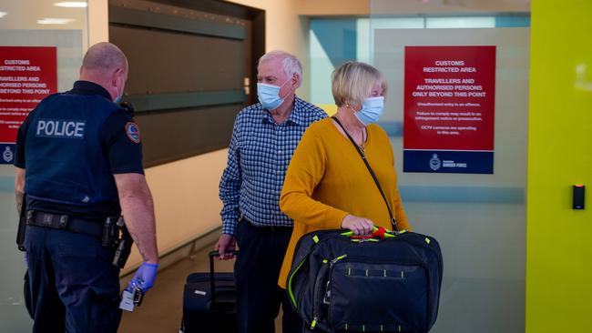 Passengers from a Melbourne flight arrive at Darwin Airport. Picture: Che Chorley