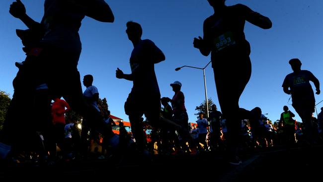 Runners on Hale Street at the start of the Bridge to Brisbane. Pic Darren England.