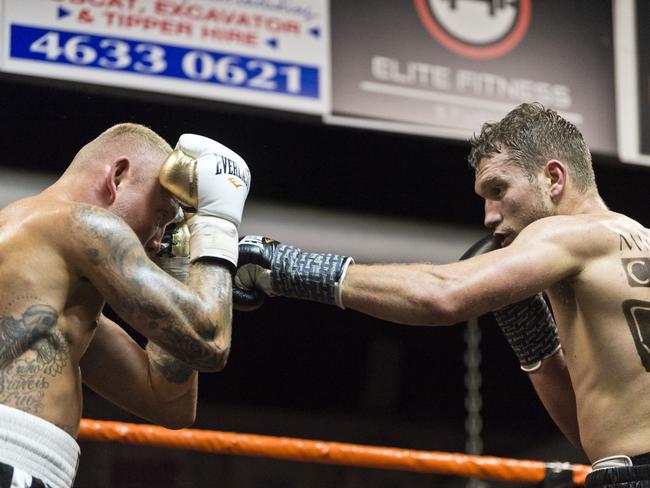 Steve Spark (right) fights Mick Whitehead as part of Locked Down Lights Up at Smithys TGW Gym, Saturday, July 11, 2020. Picture: Kevin Farmer