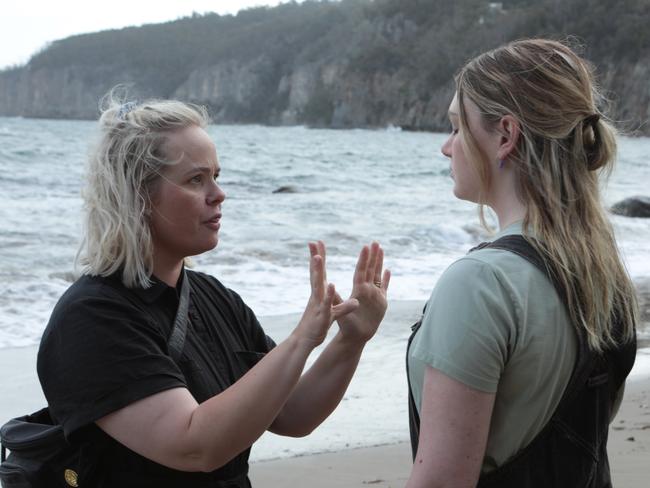 Katie Robertson works with actor Shannon Berry, who plays Bronte, on the set of TV series The Survivors. Picture: Ursula Woods