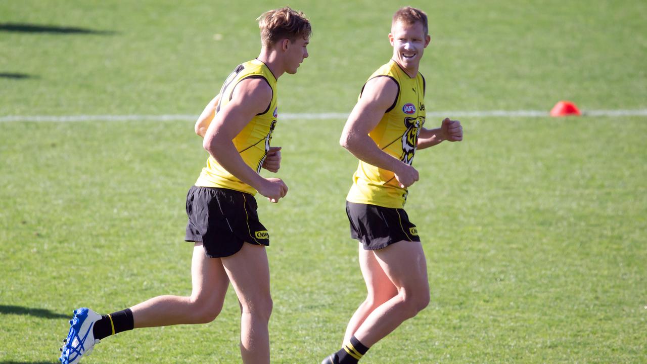 Tom Lynch and Jack Riewoldt during training.