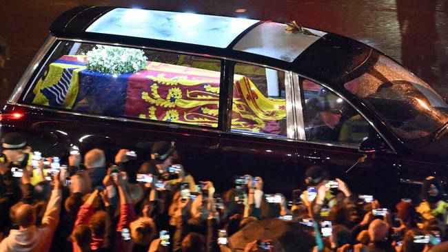 The coffin of Queen Elizabeth II is taken in a royal hearse to Buckingham Palace. Picture: Marco Bertorello/WPA Pool/Getty Images